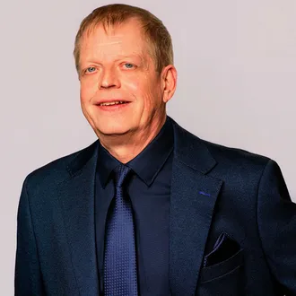 Portrait photograph of Baird & Warner Agent, John Fleming