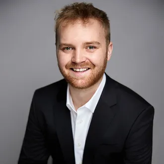 Portrait photograph of Baird & Warner Agent, Joseph Dart