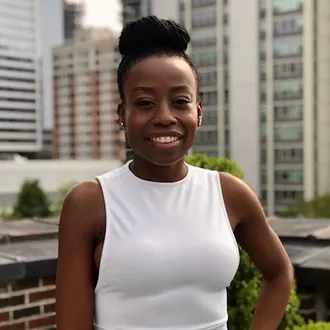 Portrait photograph of Baird & Warner Agent, Kemi Daramola