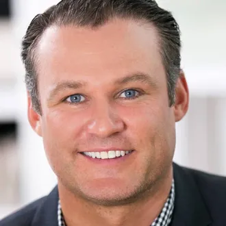 Portrait photograph of Dream Town Agent, Kevin Bigoness