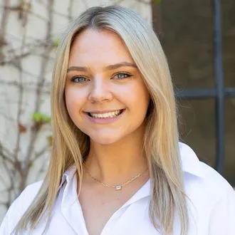 Portrait photograph of Baird & Warner Agent, Riley Bellavia