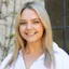 Portrait photograph of Baird & Warner Agent, Riley Bellavia